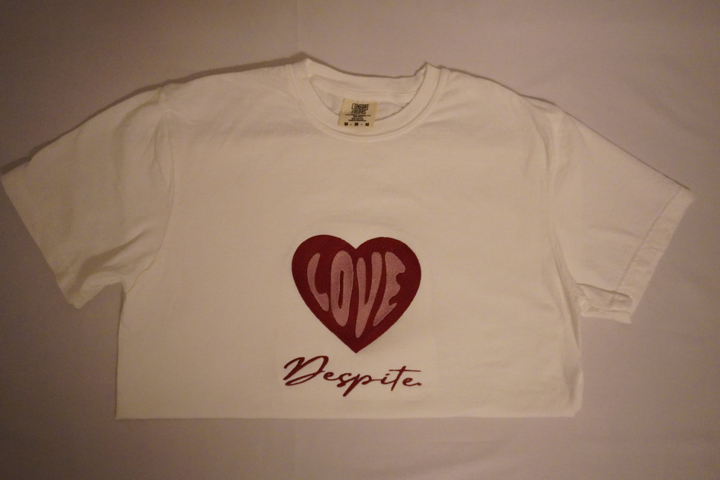 Love Despite Tee